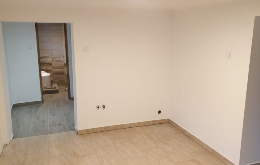 ELADÓ BELVÁROSI KERTES KIS CSALÁDI HÁZ